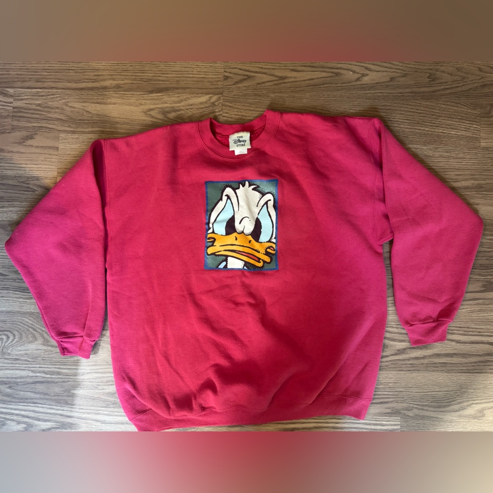 Vintage 1990s Disney Store Garment Featuring A Graphic Of Donald